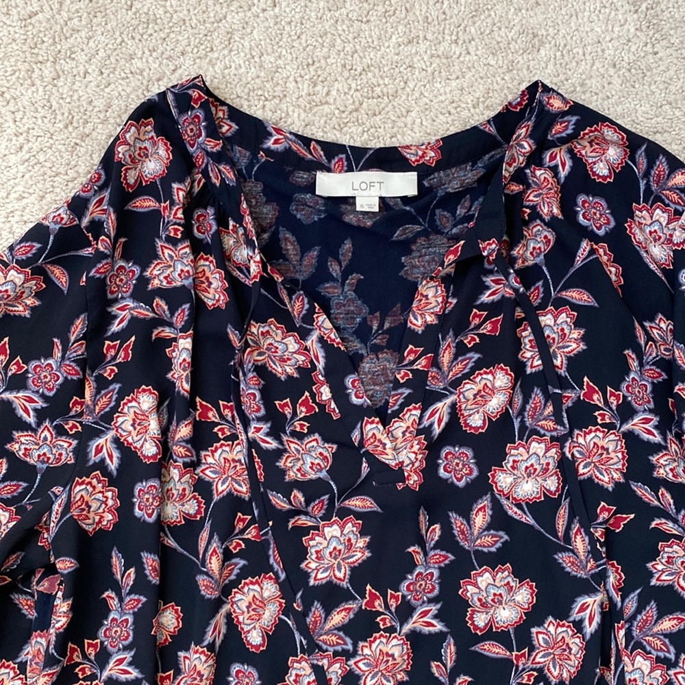 Navy floral loose peplum top